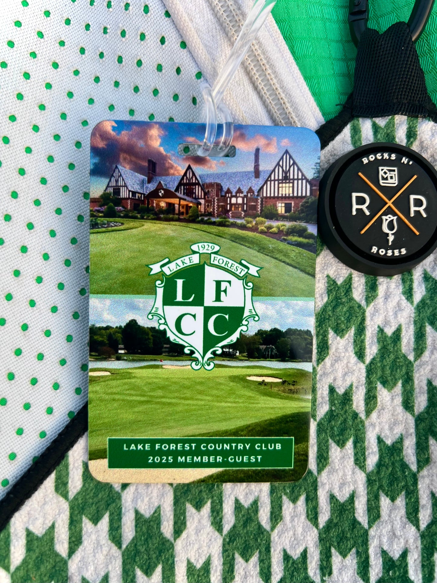 Image of an aluminum member guest golf bag tag with country club logo, image of country club clubhouse, and marquee golf hole.