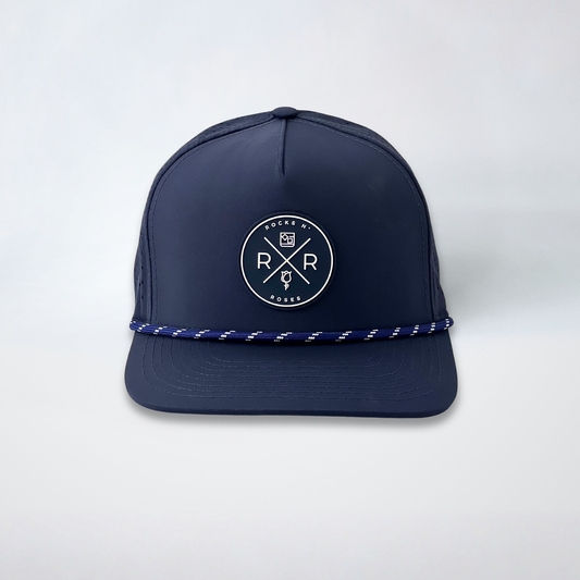 Rocks N' Roses Polyester Navy Blue Golf Hat featuring a navy blue and white rubber logo and navy blue and white decorative rope.