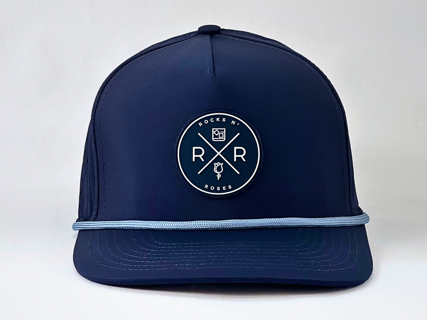 Rocks N' Roses Navy Blue Golf Hat overhead featuring a navy blue and white rubber logo, and solid light blue decorative rope.