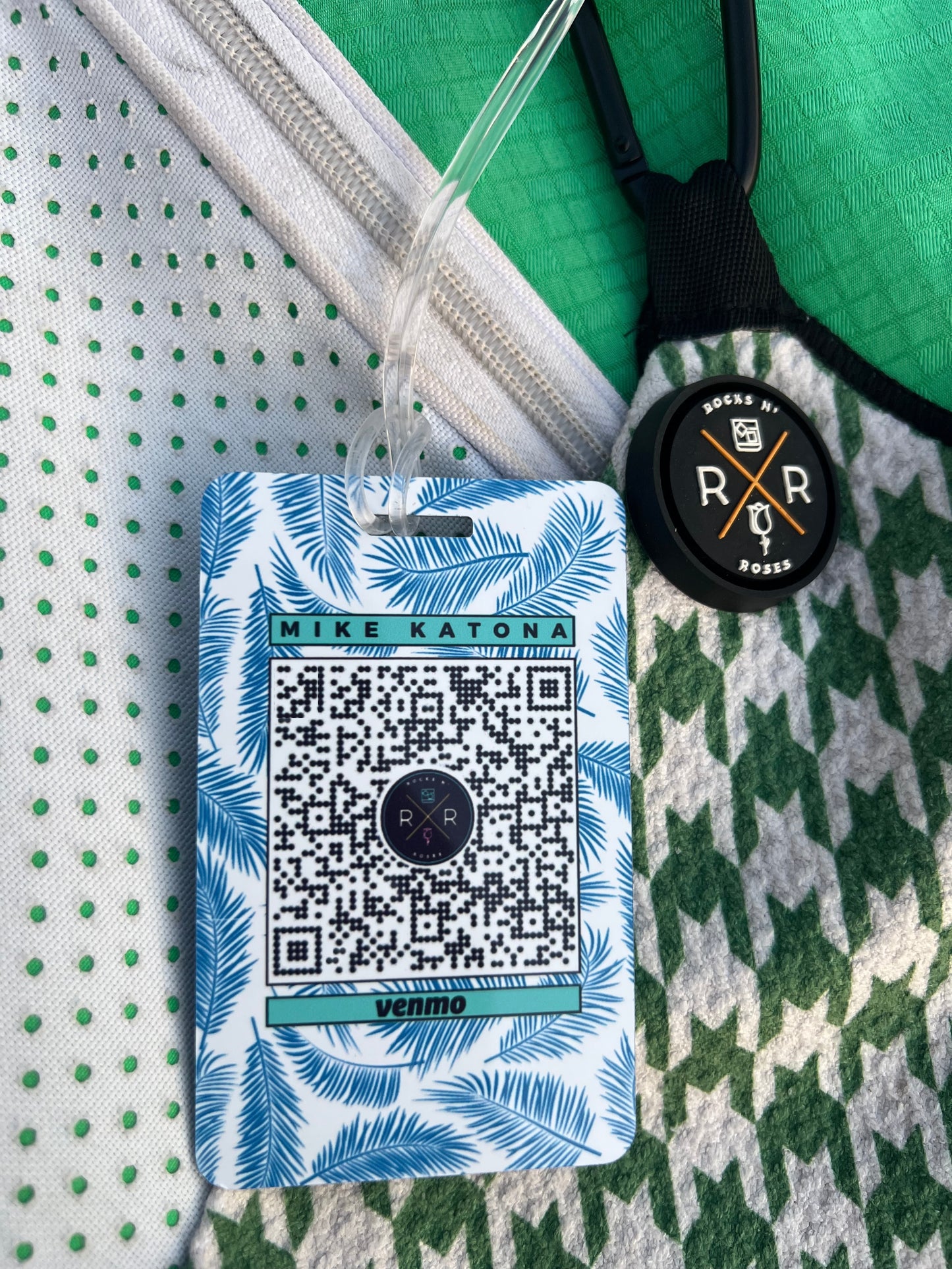 Image of the blue and white palms aluminum Venmo golf bag tag with QR code to scan to send Venmo payment.