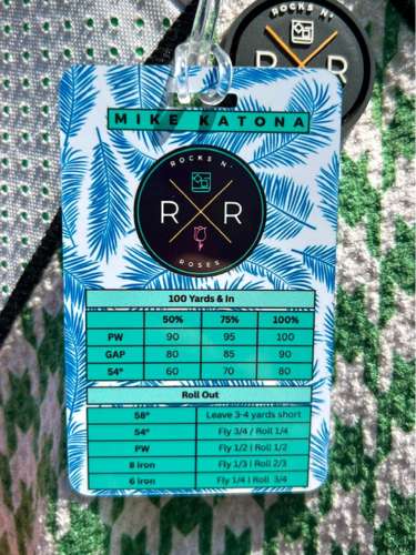 Image of the back of the blue and white palms aluminum Venmo golf bag tag featuring wedge shot yardages and rollout stats for helping with short game golf shots.