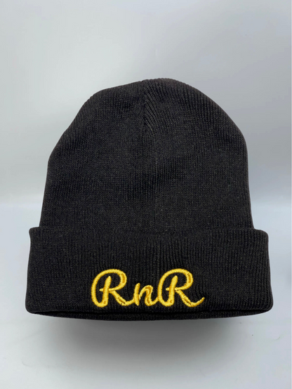 Rocks N' Roses black golf beanie featuring the Rocks N' Roses cursive RNR embroidered logo in gold.