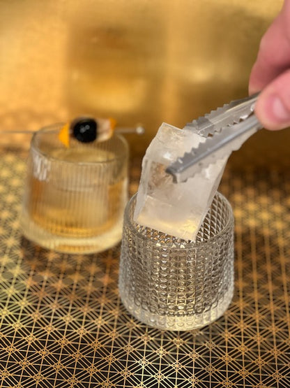 Image of the Rocks N' Roses spinning whiskey glasses and Extra Large Craft Cocktail Ice Cube.