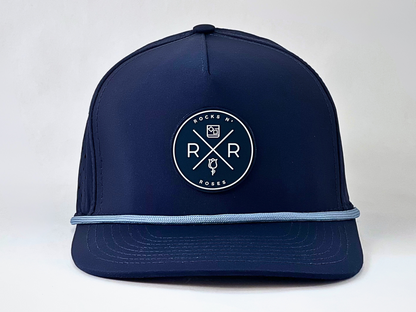 Rocks N' Roses Navy Blue Golf Hat overhead featuring a navy blue and white rubber logo, and solid light blue decorative rope.