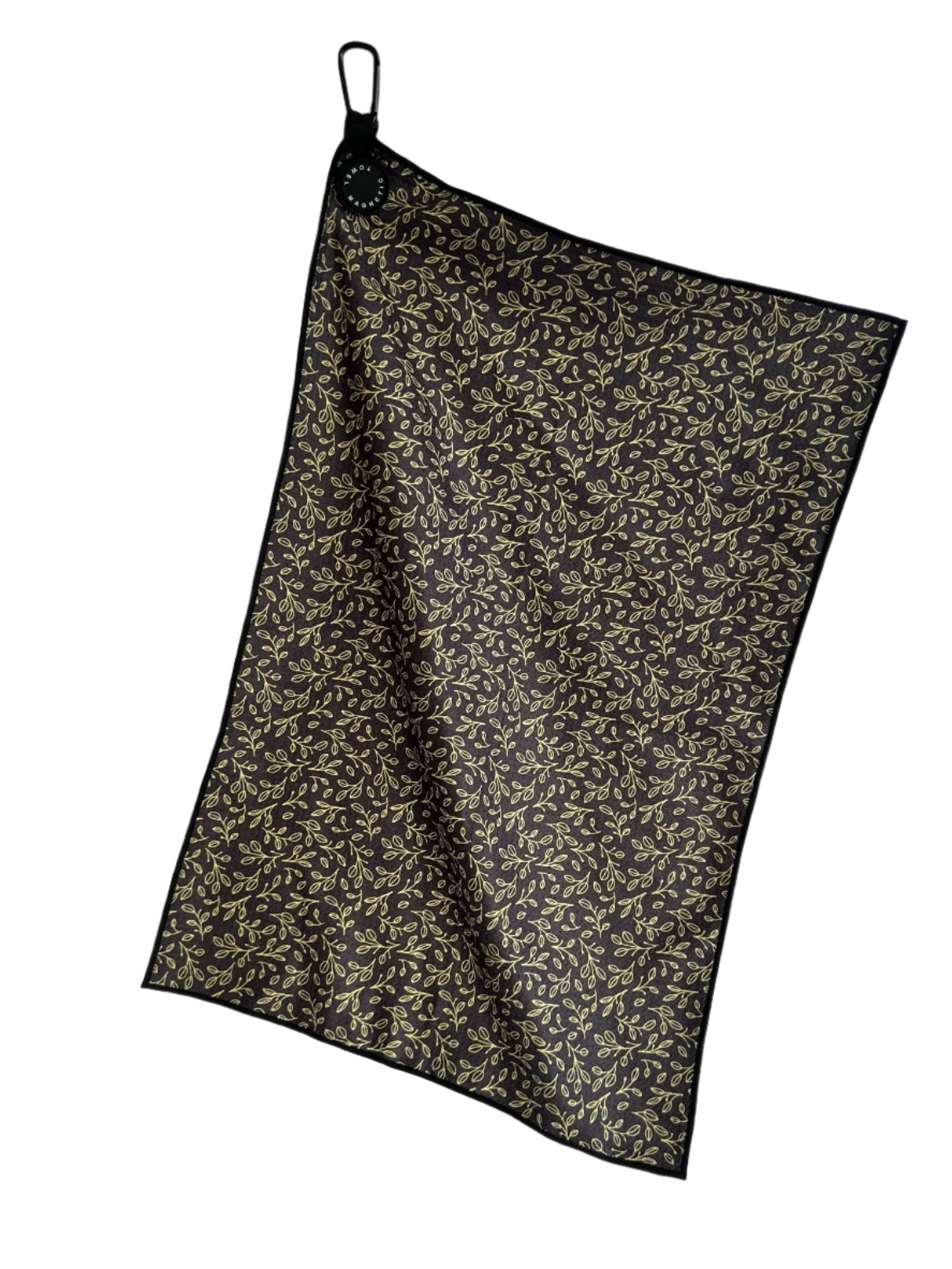 An image of Rocks N' Roses black and gold magnetic golf towel. In this image one side of the towel is shown. This side of the towel has a black background with a golf floral pattern printed on it.