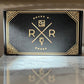 Picture of the Rocks N' Roses Bourbon Box shipper. This box has a classic art deco design on both the inside and outside of the box. The Bourbon Box also comes with the items protected in matching gold and black shredded crinkle paper.